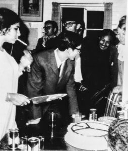 LAGUNITAS, California, July, 1967—Arlene cuts the wedding cake, Lincoln Bergman, the groom, is at her left.