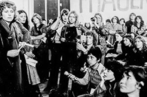 FRANKFURT, Germany, November 1974—At the feminist women's preparatory conference for UN International Women's Year in Mexico City. Sonia is kneeling with a movie camera, Norma Bengell is standing second from left. (Arlene is off camera, presenting a report on women political prisoners in Viet Nam.)