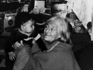 GRATON, California, November 1982—Meridel Le Sueur plays with baby Biko Eisen-Martin.