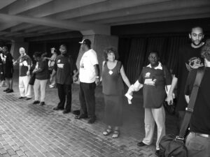 NEW ORLEANS, Louisiana, August 2006—Peoples’ Hurricane Relief organized “Hands-around-the-Dome”during the one-year anniversary to commemorate the 5-day ordeal of the survivors of Hurricane Katrina and demand their “right of return”to their homes.